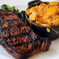 New York Strip · Hand cut flame grilled.