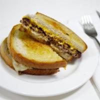 Patty Melt · Hamburger patty with grilled onions, Swiss & American cheese on grilled rye.