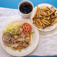 Chicken Gyro · Served with lettuce, tomato, onions, and white sauce.