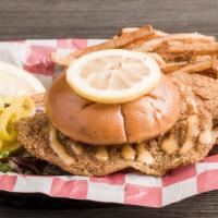The Og Tilapia Fish Sandwich Combo · Tilapia fillets tossed in our special blend of seasonings and fried to perfection. Served on...