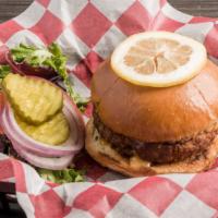 The Fishburger · Fresh salmon skinned and grounded in house, seasoned, and fried to perfection with spring mi...