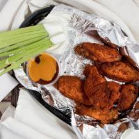 6 Wings · Your choice of regular or boneless wings in your favorite sauce.