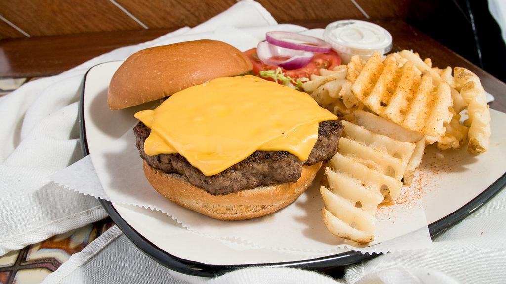 Cheeseburger · Our 1/2 lb. hamburger covered in american cheese served with lettuce, tomato, onion, ketchup, mayonnaise, and mustard on the side. Served with waffle fries, onion rings, side salad, cheese fries or seasoned curly fries.