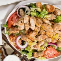 Grilled Chicken Salad · Grilled chicken served on a blend of iceberg and romaine lettuce with tomato, onion, cheese ...