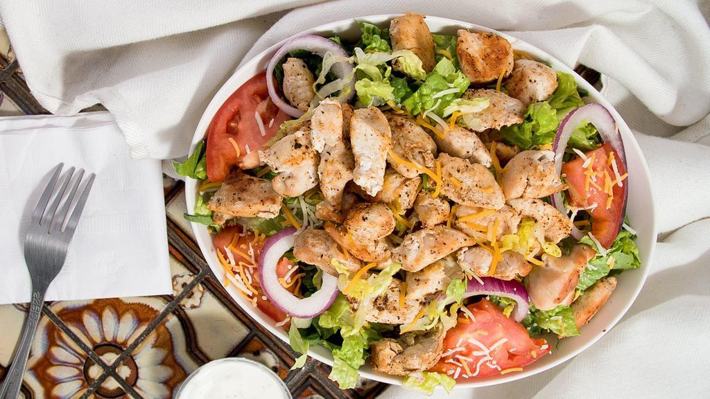 Grilled Chicken Salad · Grilled chicken served on a blend of iceberg and romaine lettuce with tomato, onion, cheese and your choice of dressing.