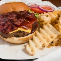 Cheddar Bacon Burger · Our 1/2 lb. hamburger covered in smokey bacon and shredded cheddar cheese served with lettuc...
