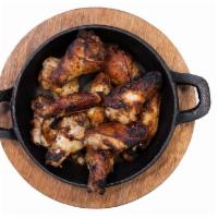 Chicken Wings · Oven baked chicken wings. Your choice of plain, buffalo, Bbq or honey sriracha. Served with ...