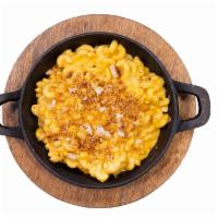 Mac & Cheese · A classic blend of cheddar cheeses, cream, and spiral noodles. Baked with shredded smoked go...