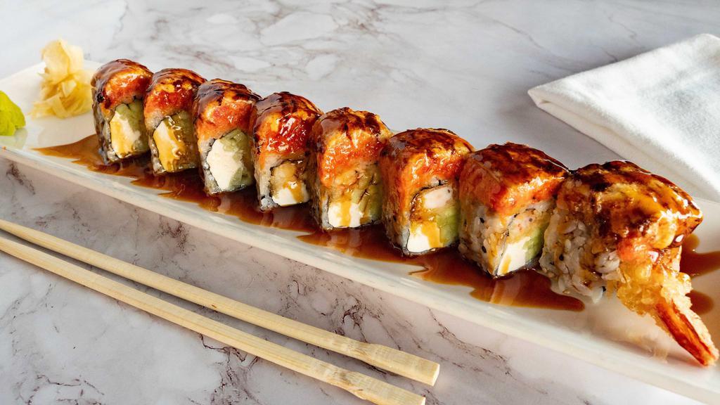 Fire Dragon · Inside: shrimp tempura, cream cheese, cucumber, Outside: seared spicy tuna w. eel sauce on top.