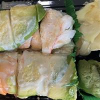 Dynamite Roll · Inside: spicy salmon, asparagus, & crunchy. Outside: steamed cold shrimp, avocado, & dynamit...