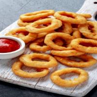 Onion Rings · Sweet onion wrapped in a crunch of perfectly crispy breading