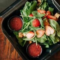 Spinach Salad · Spinach, strawberries, croutons, and gorgonzola, with raspberry basil champagne vinaigrette ...