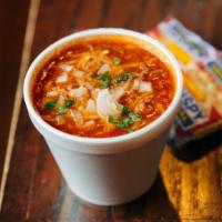 Beerhouse Chili · Beer & Beef Chili topped with Shredded Cheese and Diced Onions.