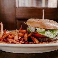 Impossible Burger™ · This veggie burger is impossibly delicious. Lettuce, Tomato, Pickle, Onion.
