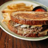 Patty Melt · 1/2 pound patty, grilled onions, with big eye Swiss and american, served on marbled rye.