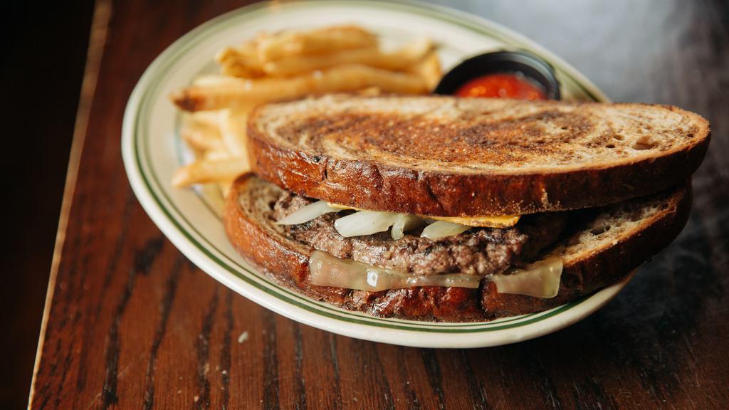 Patty Melt · 1/2 pound patty, grilled onions, with big eye Swiss and american, served on marbled rye.
