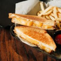 Grilled Cheese · Lomah Cheddar, fontina, and American on sourdough.