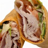 Turkey Club Wrap · Honey-smoked turkey with bacon, chipotle mayo, tomatoes and spring mix lettuce rolled into a...