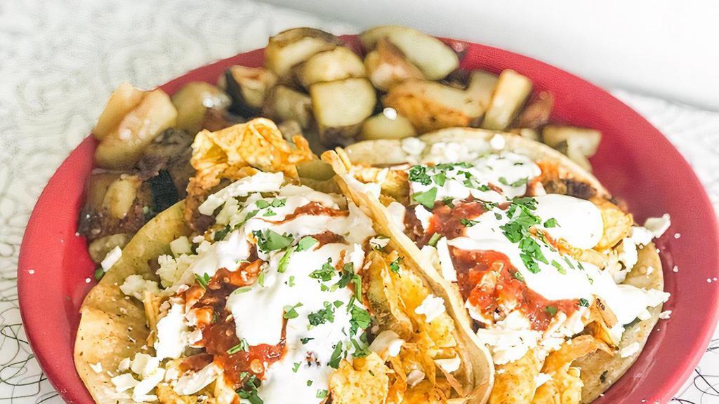 Breakfast Tacos · Two corn tortillas stuffed with chorizo, scrambled eggs, topped with rojo salsa, queso fresco and a drizzle of crema. Served with HOE fries. HOE fries can be substituted with any lunch side for the listed up-charge.