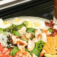 Dr Bob'S Cobb Salad · Grilled chicken, cheddar cheese, blue cheese crumbles, tomato, avocado, hard boiled egg and ...