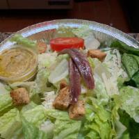 Classic Caesar · Romaine lettuce. Parmesan homemade croutons tomato and anchovies
