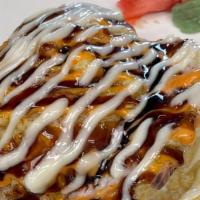 Monkey Brain · Spicy. Lightly battered avocado, spicy tuna, and crab salad, topped with eel sauce, spicy ma...