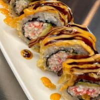 Golden California Roll · California roll deep fried topped with spicy mayo and eel sauce.