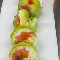 Ocean Roll · Spicy. Soy paper, tuna, salmon, avocado, jalapeño, and cilantro, topped with chili oil and s...