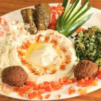 Vegetarian Mix, Falafel (4) Grape Leaves (2) · Hummus, baba ganouj, tabbouleh salad, Jerusalem salad served with pita breads.