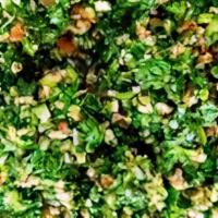 Tabbouleh Salad · Finely chopped parsley, onion, tomato, mint, and cracked wheat topped with olive oil and lem...