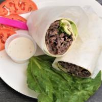 Beef Shawarma Wrap · Beef shawarma with lettuce, tomato, pickle, cucumber, spread of hummus and topped with tahin...