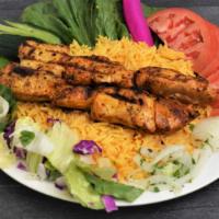 Chicken Shish Tawook Entree · Two skewers of tender pieces of chicken breast with onion and special spices.