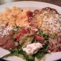 Enchilada Combo Plate · Three enchiladas, chicken, beef and steak with flour tortillas, shredded cheese, and enchila...