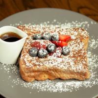 Brioche French Toast · A thick slice of custard soaked brioche with real maple syrup.