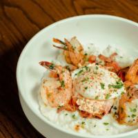 Shrimp & Pimento Cheese Grits · Four sautéed shrimp and a poached egg on top of cheesy pimento grits with marinated tomato a...