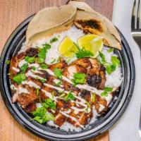 Jerk Chicken Bowl · Chicken thighs marinated in a seasoning mixture dominated by spices and chilis. Grilled to b...