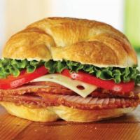 Ham Classic · Honey Baked Ham topped with Swiss cheese, lettuce, tomato, Duke’s® mayonnaise, and hickory h...
