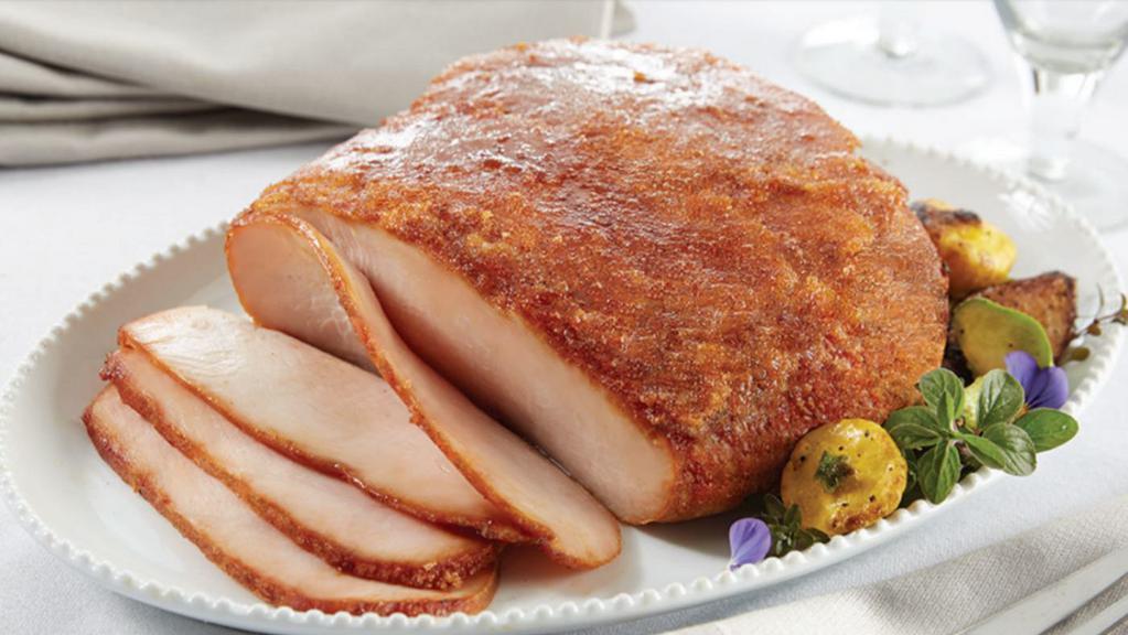 Smoked Turkey Breast · HoneyBaked has changed boring, predictable turkey. You may think you've had turkey before, but if you've never had Honey Baked™ Turkey Breast, you have a whole new experience in store. Turkey has never tasted so good! Perfectly seasoned for the most juicy, tender and delicious taste infused into every bite. It's indulgence at its best - everyone loves it. We think you'll agree that this turkey is like no other - and is the World's Best Turkey. Premium 100% white breast meat and hand-crafted in store with our sweet crunchy glaze. Fully cooked, pre-sliced and ready to serve. Serves 6-8 / Weight 2.5-3 lb.