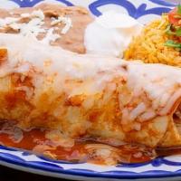 Casa Bonita Burrito · Large flour tortilla, marinated skirt. steak, chihuahua cheese, beans, sour cream, lettuce a...