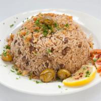 Mujadra · Tender lentils cooked in a specially seasoned rice topped with deep fried onions. Served wit...