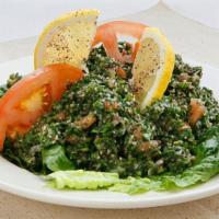 Tabbouleh · Diced tomatoes, minced parsley, onions and cracked wheat in lemon juice & olive oil.