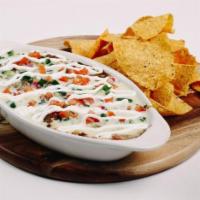 Small Nacho. · Your choice of meat, refried beans, black beans, monterey jack cheese, Yabo’s queso, pico de...