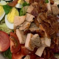 Chicken Club Salad · Sous vide chicken breast, bacon, boiled egg, feta cheese, tomatoes, cucumber, lettuce mix.