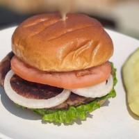 Grilled Impossible Burger · Grilled Impossible burger, toasted brioche bun, lettuce, tomato, onion, pickle.
