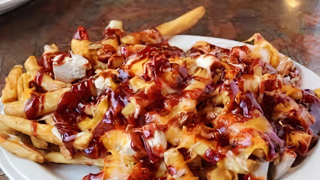 Bbq Fries · French fries with burnt ends, smoked sausage, or smoked turkey, shredded cheese, green onions and bbq sauce