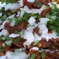 Birria Beef Fries · French fries with birria beef, shredded cheese, red onion, sour cream and cilantro
