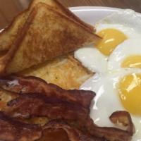 2 Eggs With Bacon · All breakfasts are served with hash browns or home fries and your choice of wheat, white or ...