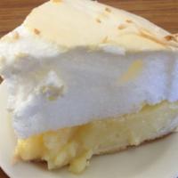 Homemade Lemon Meringue Pie · slice of homemade pie.