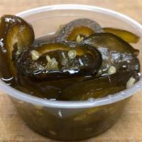 Side Of Candied Jalapeños · About 3 oz of our house made candied jalapenos--the perfect marriage of sweet and heat and a...