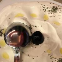 Labne · Thickened homemade yogurt with fresh dill, mint, garlic and walnut.